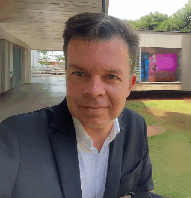 A professional, front-facing headshot of Alessandro Gonçalves Campolina, a geriatrician and psychotherapist speaking at the 3rd WCTCIM.