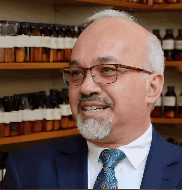 Professional headshot of speaker Ashley Ross, Head of the Department of Homeopathy at the Durban University of Technology.