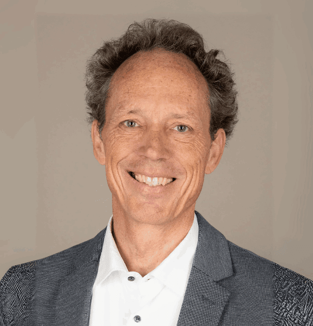 Stephan Baumgartner, a professor focused on homeopathic and anthroposophic medicine research, in a professional portrait.