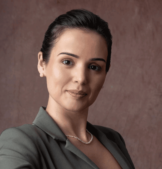 Professional headshot of Andréia Santos, a Brazilian pediatrician and Ayurvedic therapist, speaking at the 3rd WCTCIM.