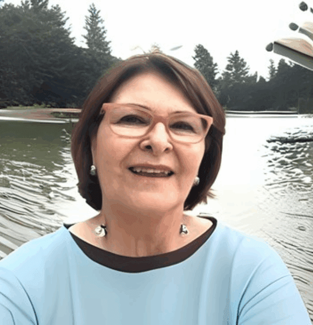 A professional headshot of speaker Silvana Nagai. She has short dark hair, is smiling lightly, and is wearing professional attire.